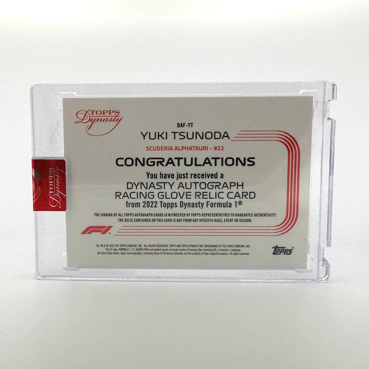 04/10 - Yuki Tsunoda #DAF-YT - Auto Racing Glove Relic - 2022 Topps Dynasty F1