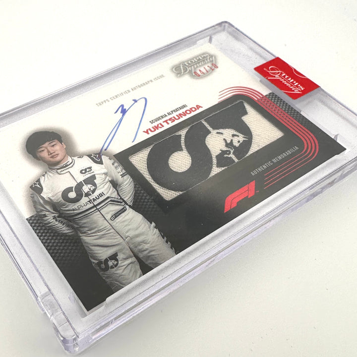 04/10 - Yuki Tsunoda #DAF-YT - Auto Racing Glove Relic - 2022 Topps Dynasty F1