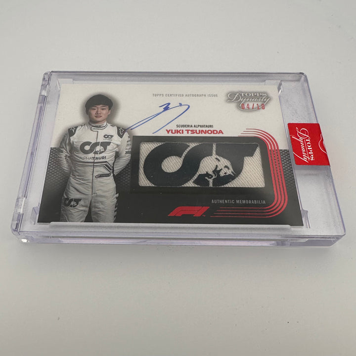 04/10 - Yuki Tsunoda #DAF-YT - Auto Racing Glove Relic - 2022 Topps Dynasty F1