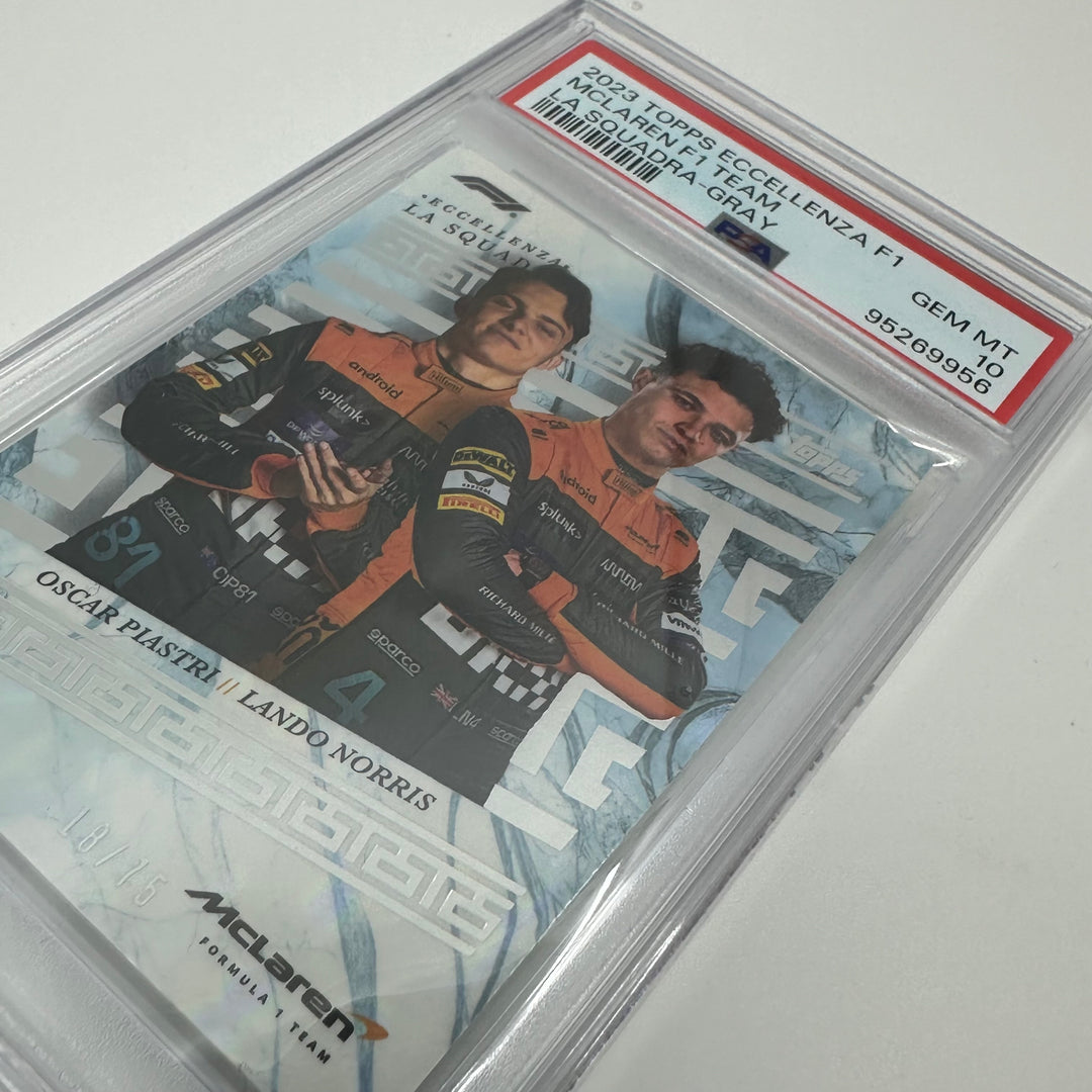 PSA 10 - /75 Norris/Piastri - McLaren F1 Team - Gray - 2023 Eccellenza La Squadra