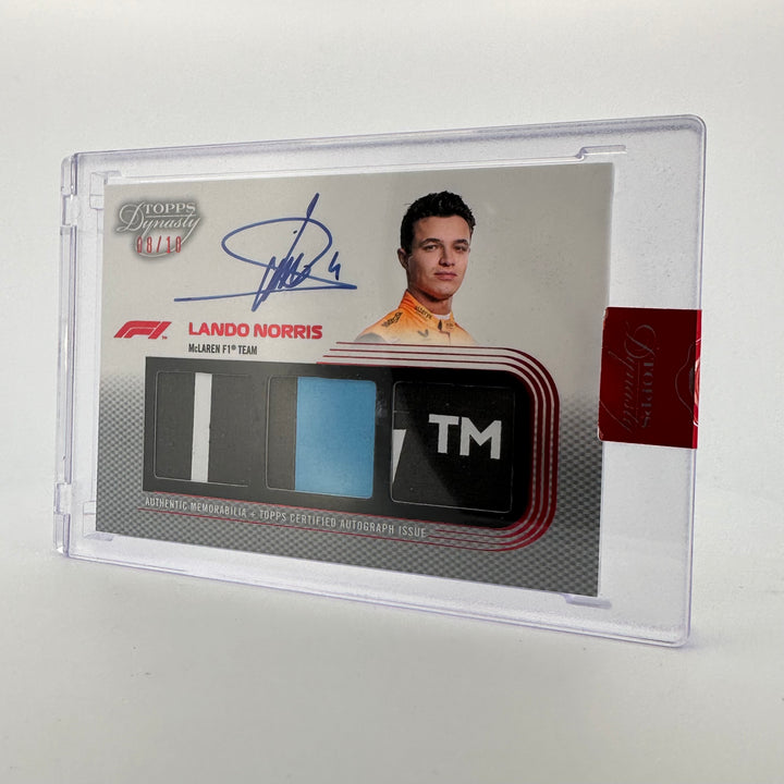 08/10 Silver - Lando Norris #SDTRA-LN - 2022 Topps Dynasty Triple Relic Autograph
