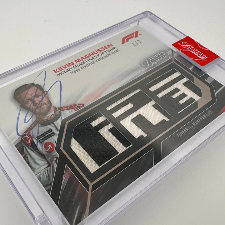1/2 Kevin Magnussen #SDTRA-KMII - Triple Relic Autograph - 2023 Topps Dynasty F1