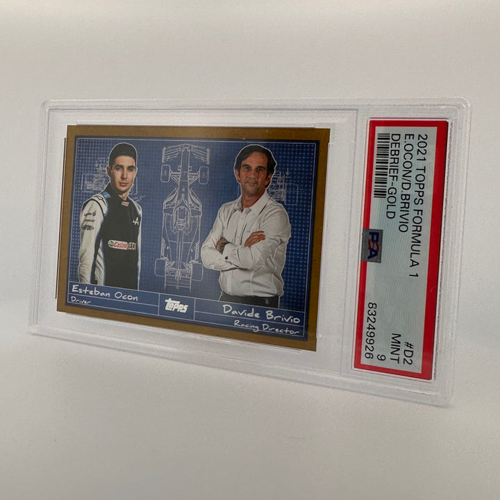PSA 9 - 23/50 - Esteban Ocon/davide Brivio - Debrief #D2 - Gold