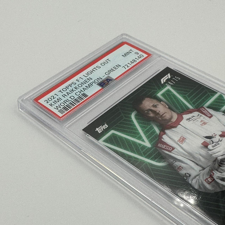 PSA 9 - 64/75 Kimi Raikkonen - Drivers World Champion